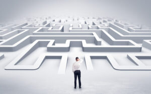 Businessman starting a flat 3d labyrinth