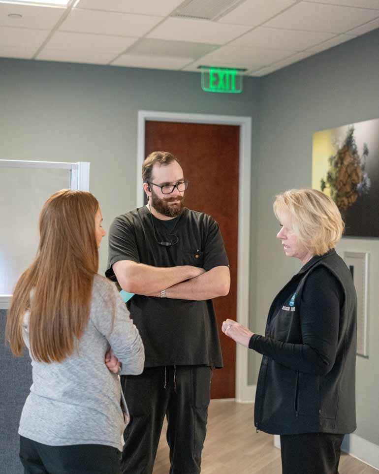 Rezilir Health Staff discussing health issues