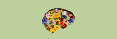 Brain cutout with flowers growing inside