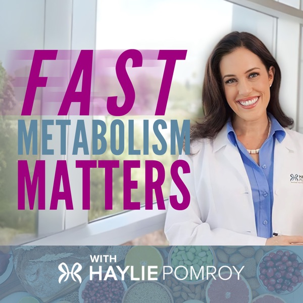 Haylie Pomroy in a white coat, arms crossed, smiling